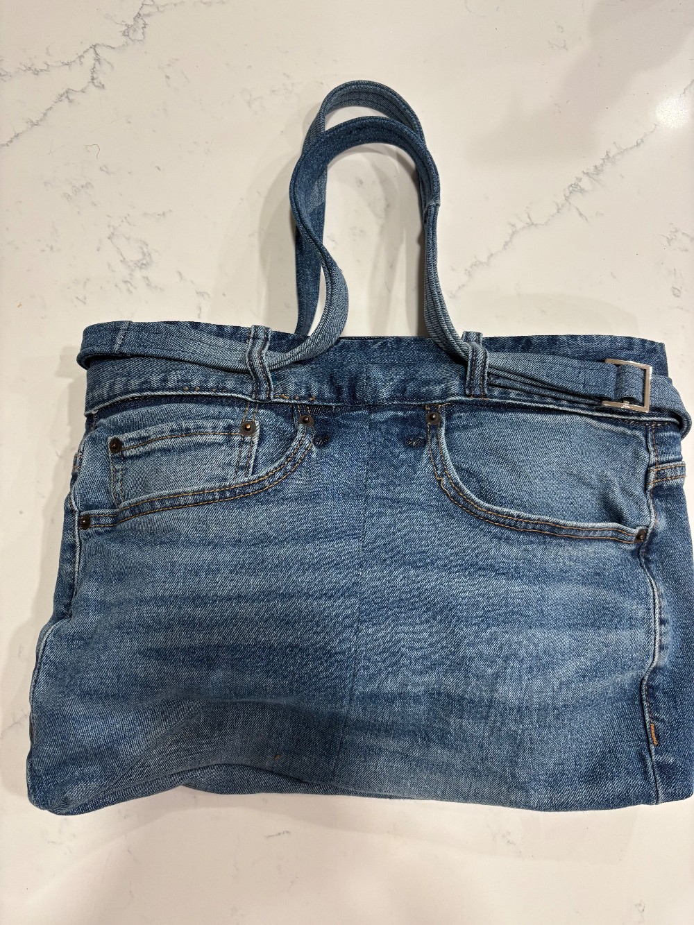 A denim purse made from old jeans.