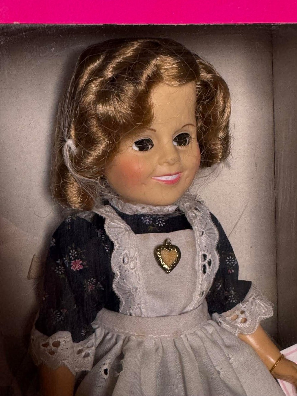 2625 -  1982 Shirley Temple doll by Ideal is part of a collector's set, featuring a dress inspired by the movie 