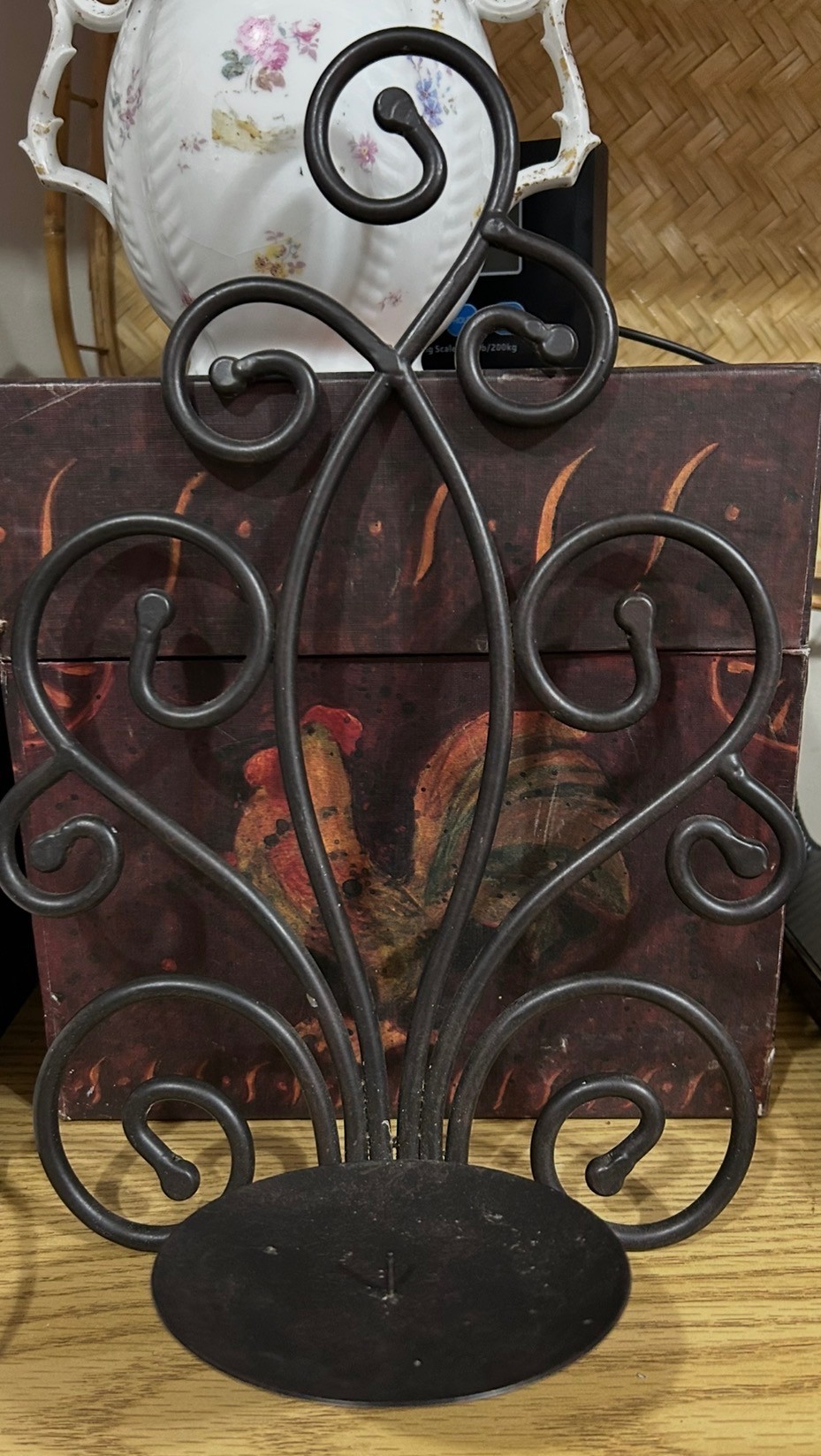 Black metal scroll candle holder