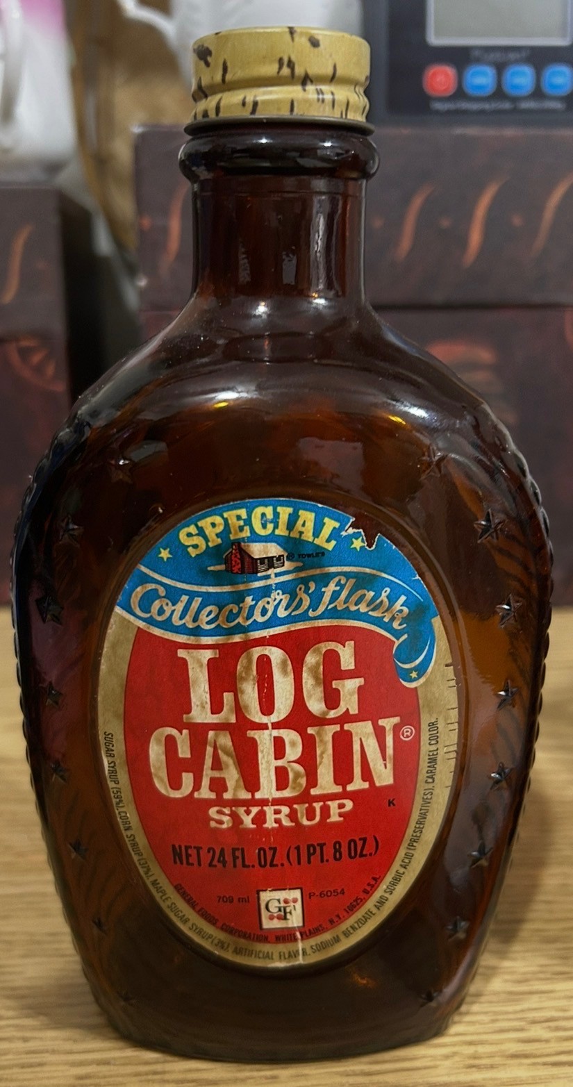 Vintage Brown amber bottle has the Statue of Liberty