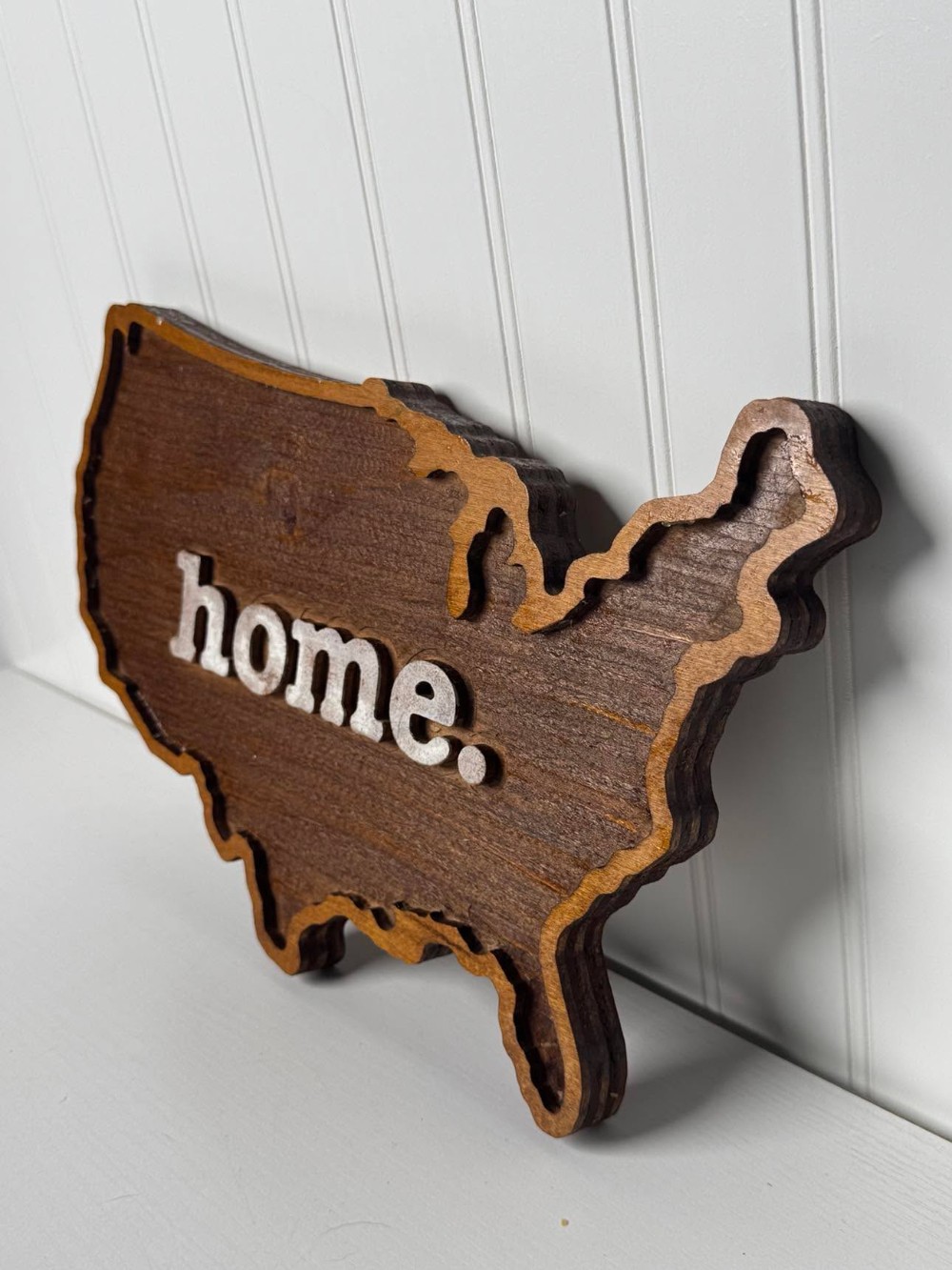2605 - Layered wooden design shaped like the United States of America with the word 