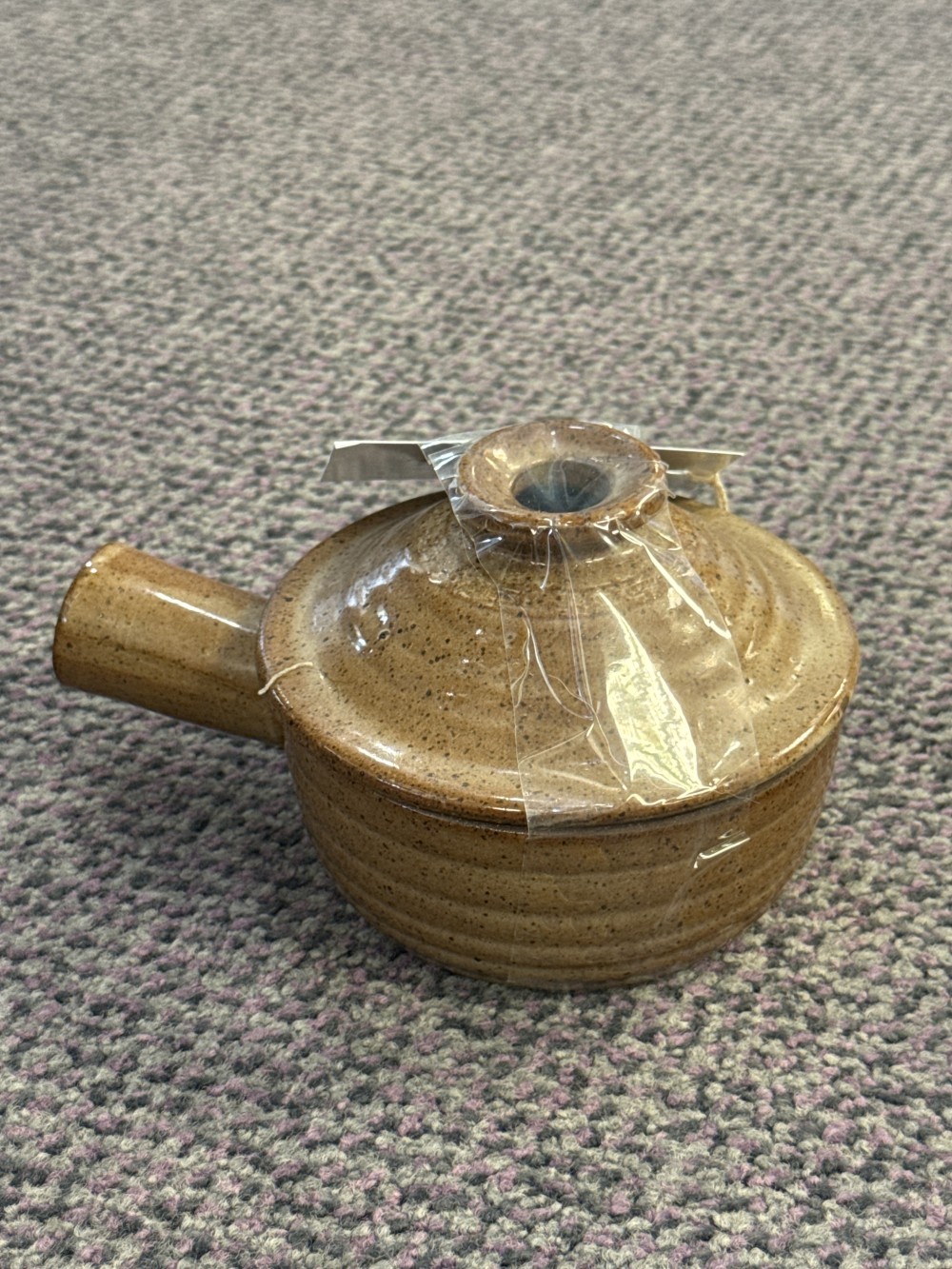 1006 - stoneware microwave cooker also known as Stone wave cooker