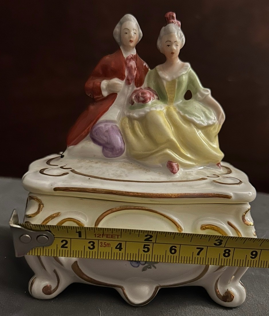 Vintage porcelain trinket box with Victorian figurines