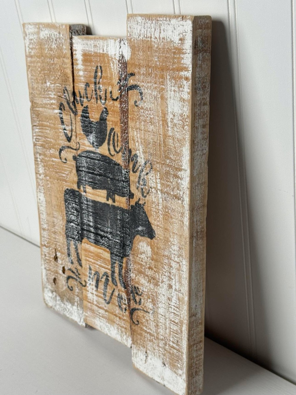 2603 -  rustic wood plank sign features a stenciled farm scene of a cow, pig, and chicken stacked together  (8.5x.5x11)