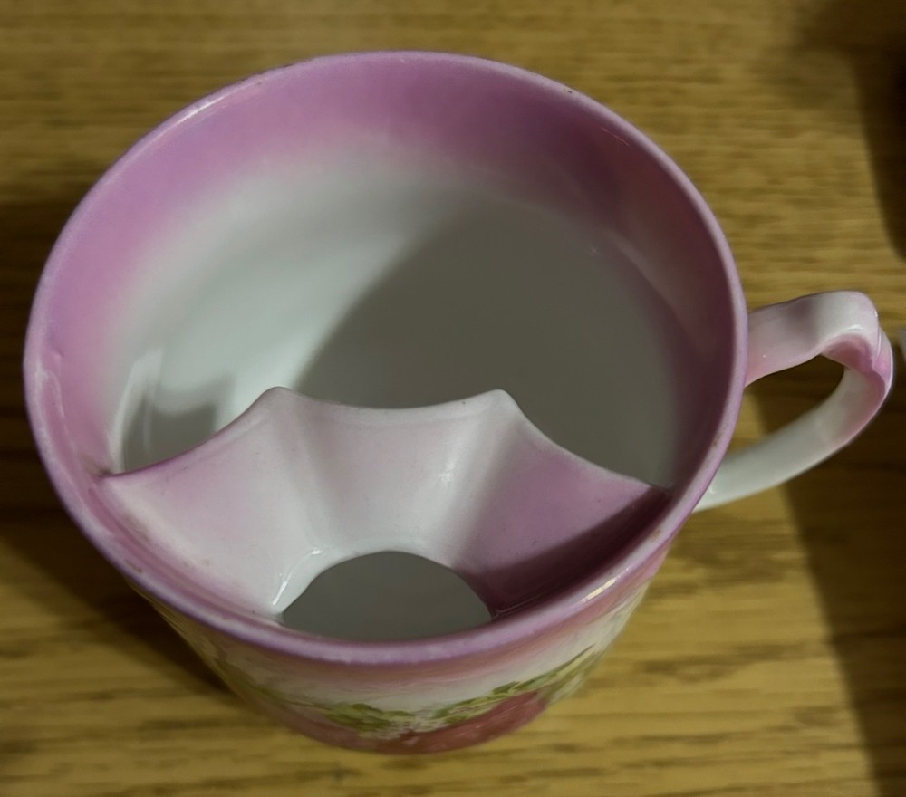 Antique mustache tea cup during Victorian era (1860-1920)