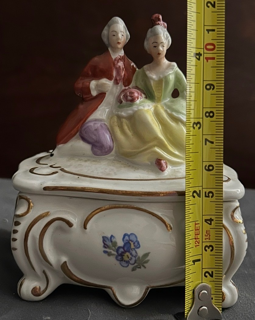 Vintage porcelain trinket box with Victorian figurines