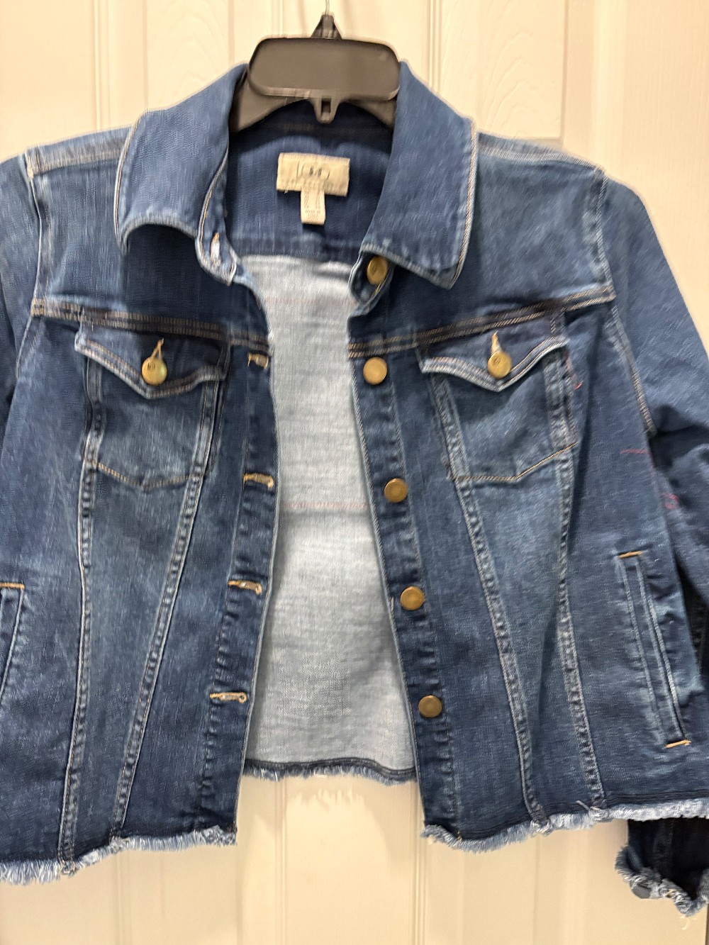 Jean jacket with scrappy fabric flag on back!