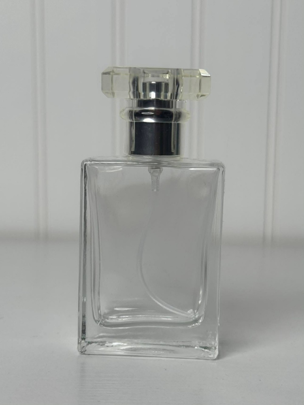 2546 - Clear, rectangular empty glass spray bottle designed for perfume or cosmetics (2x1x4)