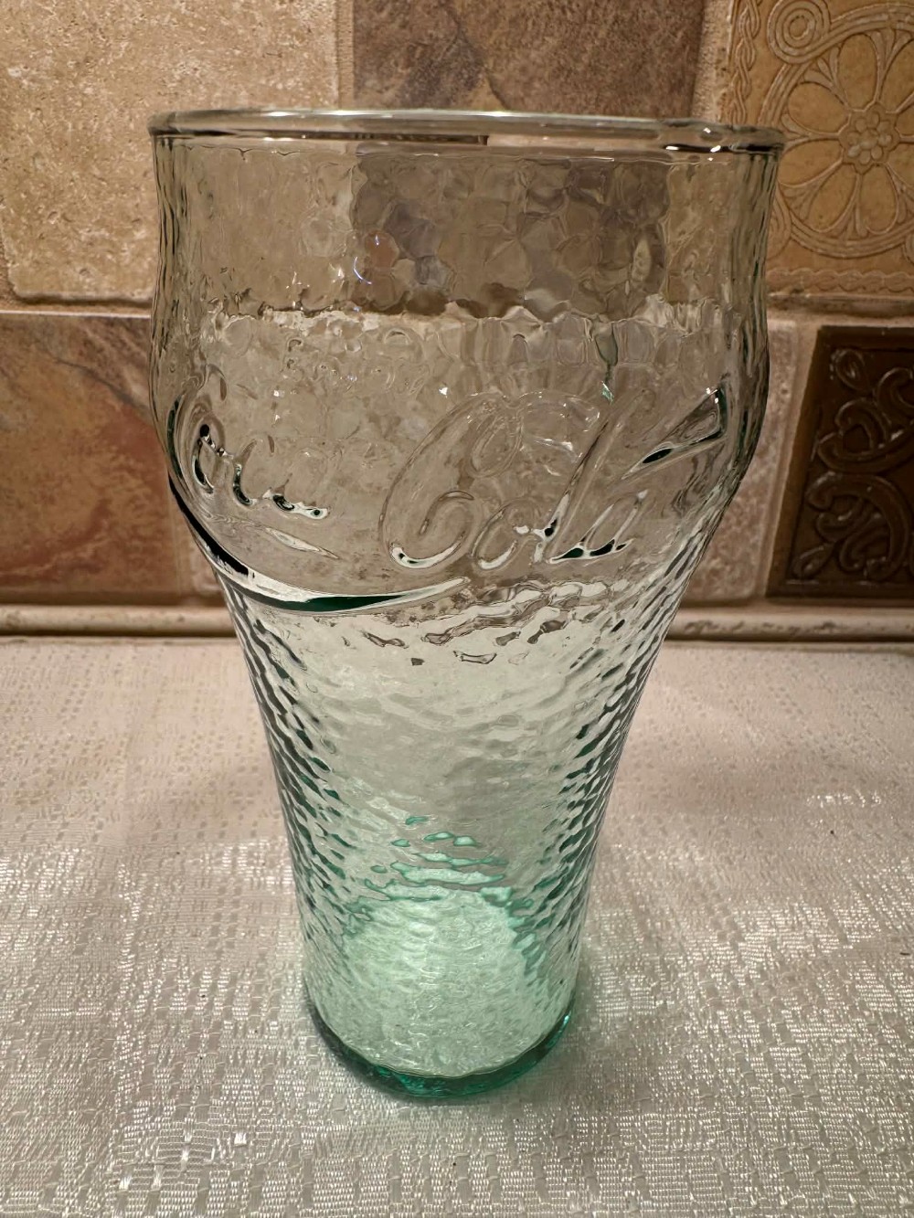 1592 - vintage green pebbled glass tumbler featuring the 