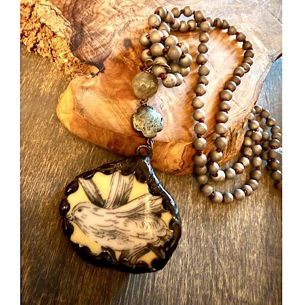 Broken china soldered pendant in vintage cream/yellow/gray floral/birds w/ stone toppers on long knotted druzy bead strand