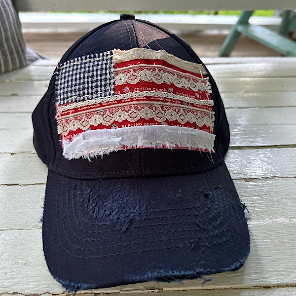 Hat:  Navy hat with rag flag embellished