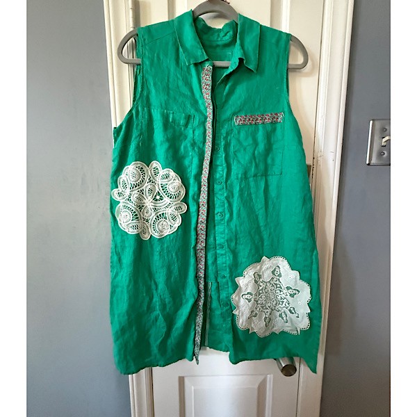 Top:  Sleeveless teal cotton button up w/ doily appliques and colorful trim