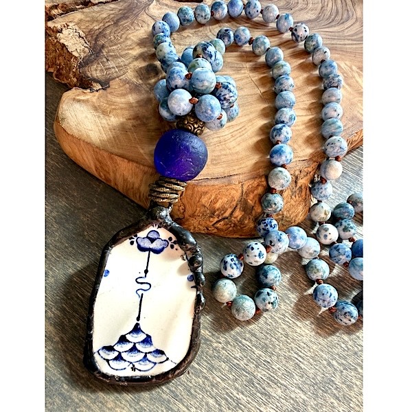 Broken china soldered pendant in blue/white w/dark blue glass bead on long knotted sodalite stone bead strand
