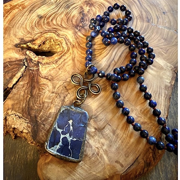Soldered dark blue sea jasper nugget on long knotted indigo jade bead strand