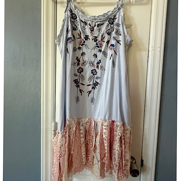 Top: Sleeveless blue cotton top w/embroidery details & lace fringe