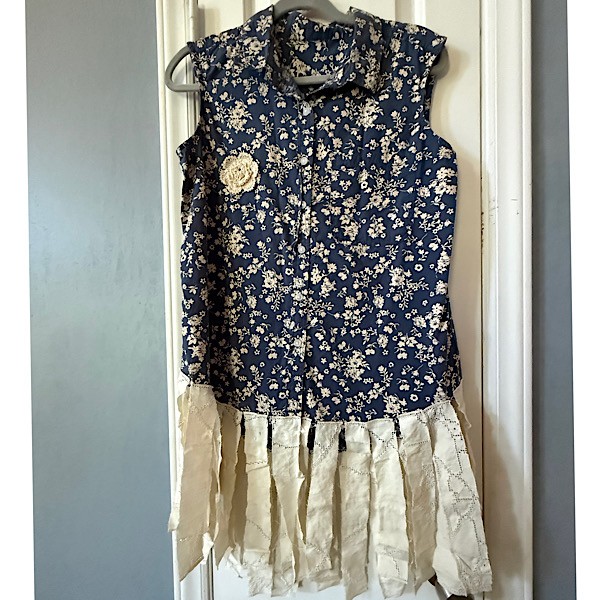 Top: Sleeveless blue floral button up top w/lace fringe and doily applique