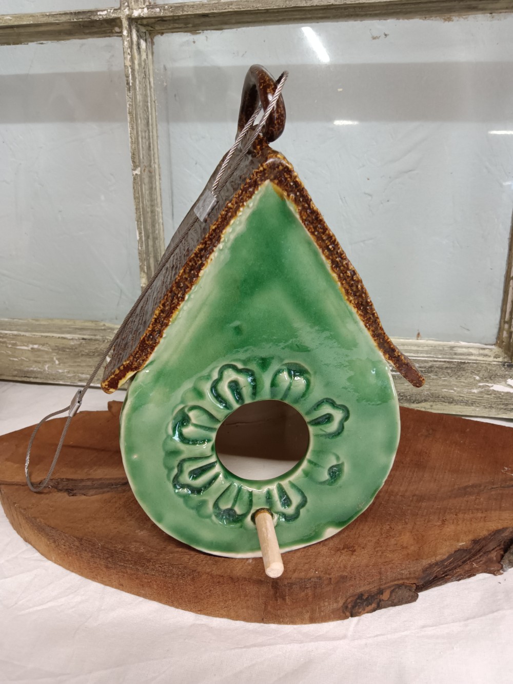 Dark Green Birdhouse with Flower Design