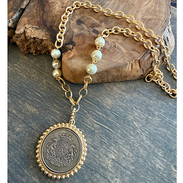 1Replica silver medallion in matte gold bezel on short chain of linked pearls  and matte gold