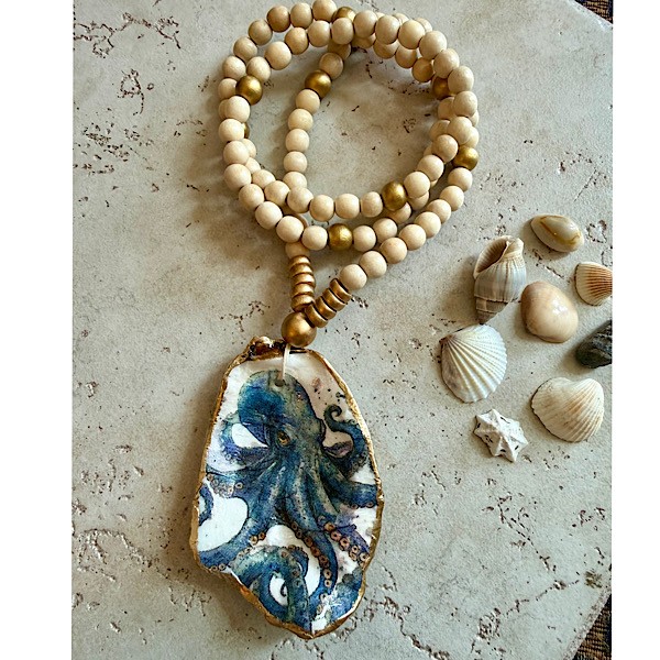 Oyster shell in decoupaged octopus motif on long wood bead strand