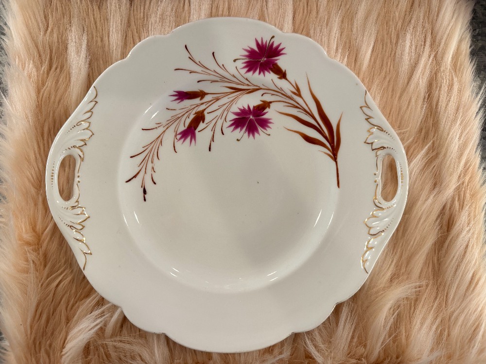 Bone china cutout handle plate