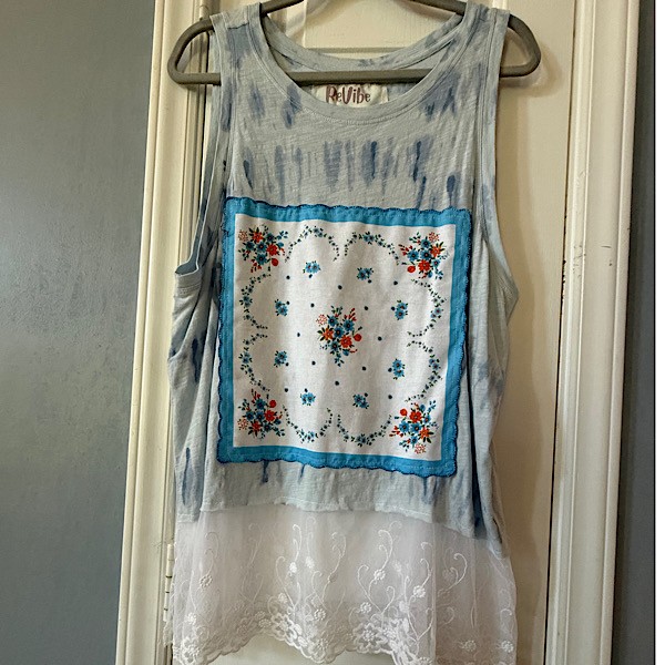 Top: Sleeveless blue tie dye tee w/lace skirting and hankie front applique