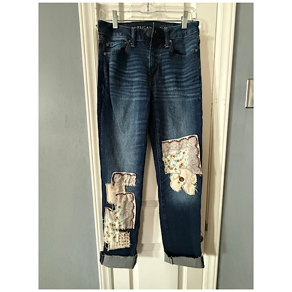 Jeans: AE darker wash with patchwork in shades of cream/brown.  28 waist