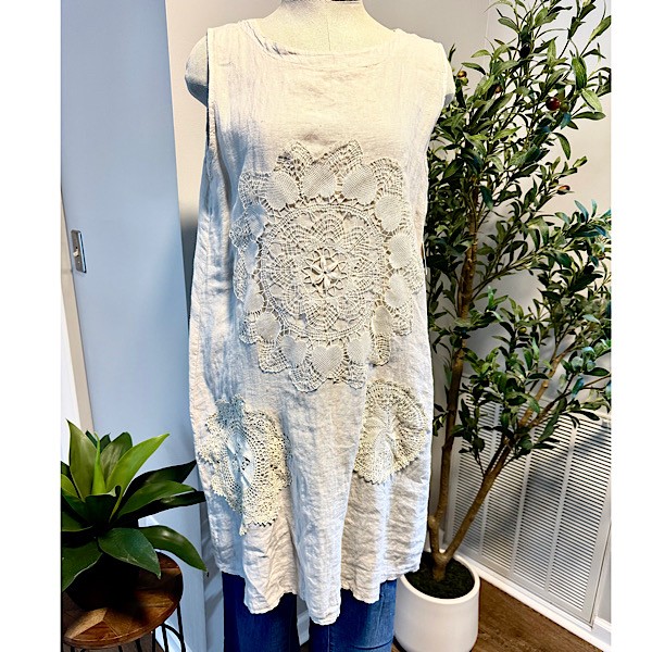 Dress:  Linen dress , knee length in light natural w/hand appliqued vintage doilies.  tie back closure at neck.  M/L
